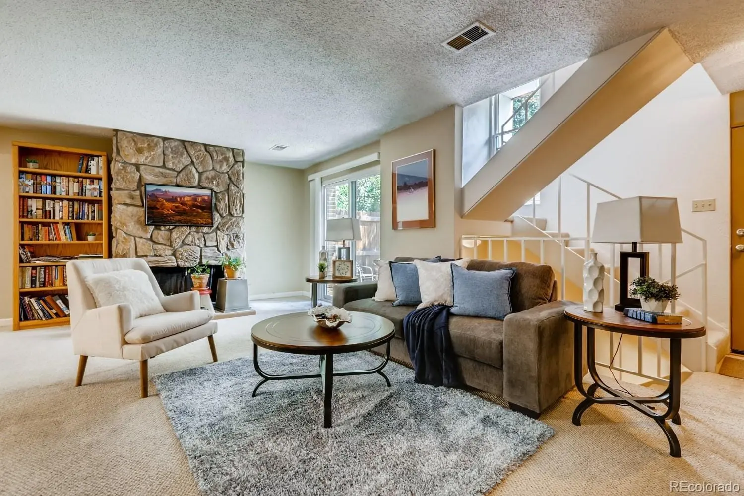A living room with furniture and a wooden floor at 2847 South Locust Street