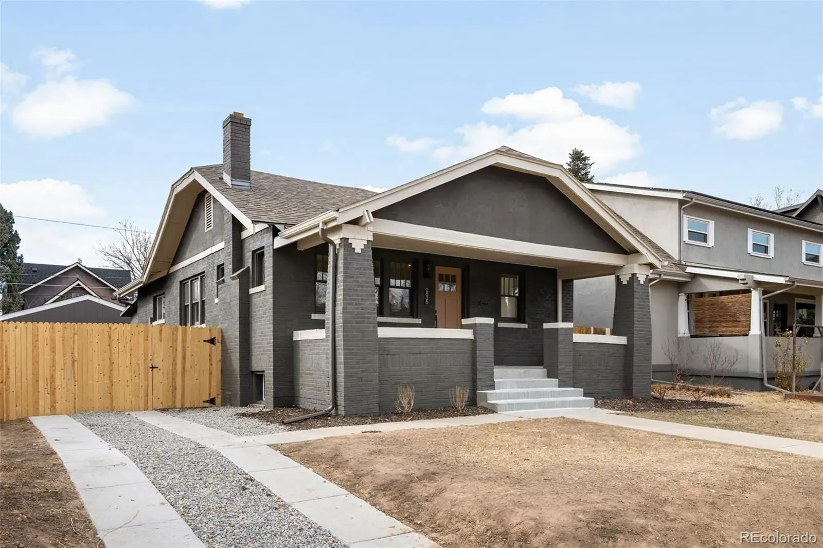 A front view of a house with a garage at 2835 Cherry Street