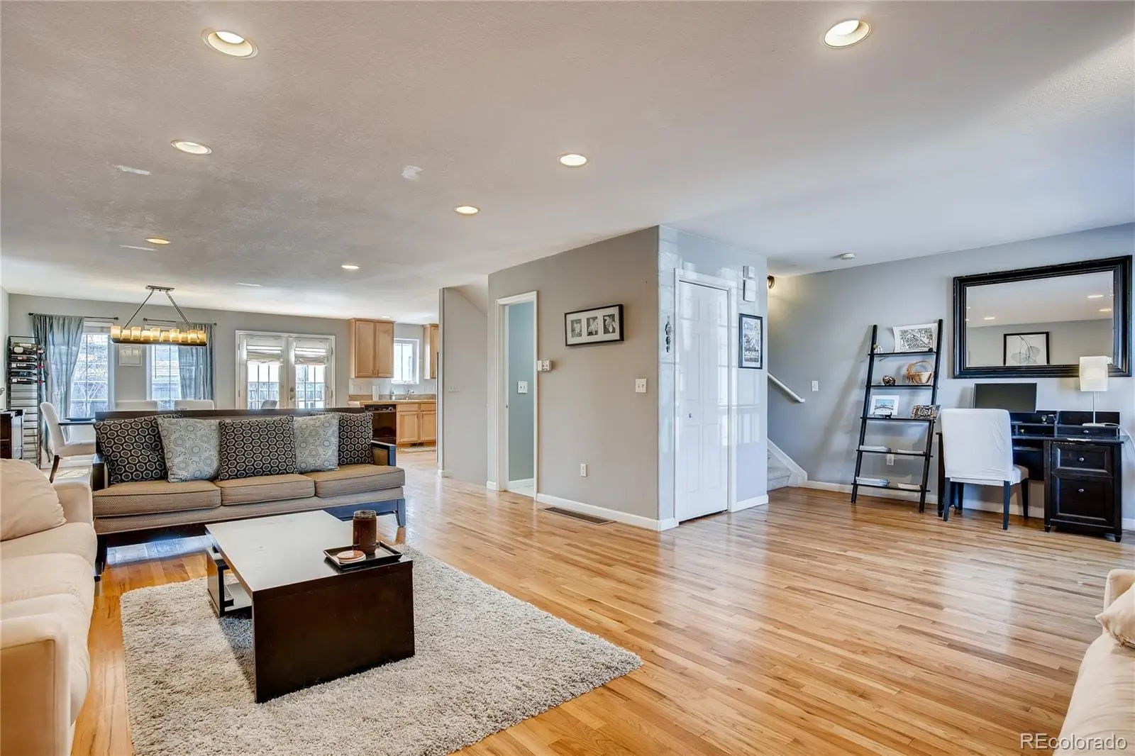 A living room with furniture and a wooden floor at 1126 West 10th Avenue