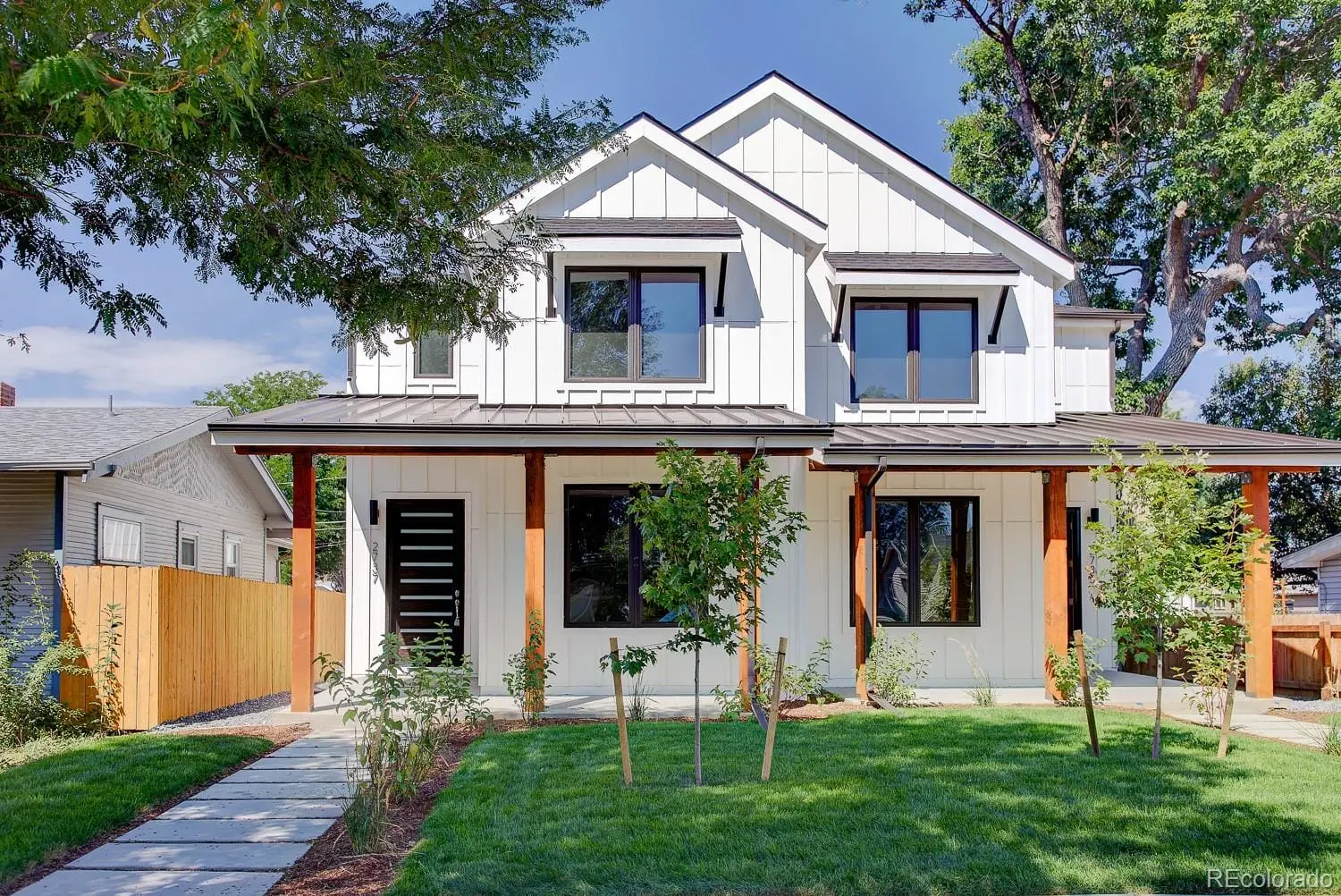 A front view of a house with a yard at 2851 South Cherokee Street