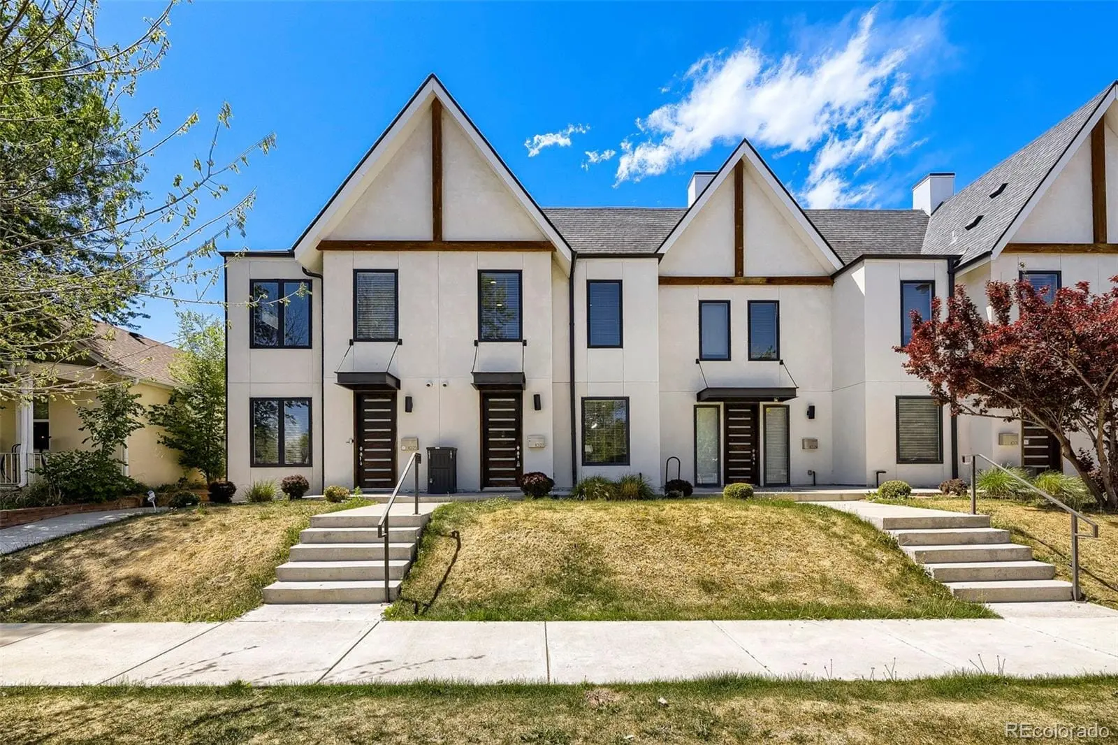 A front view of a house with a yard at 1027 Julian Street