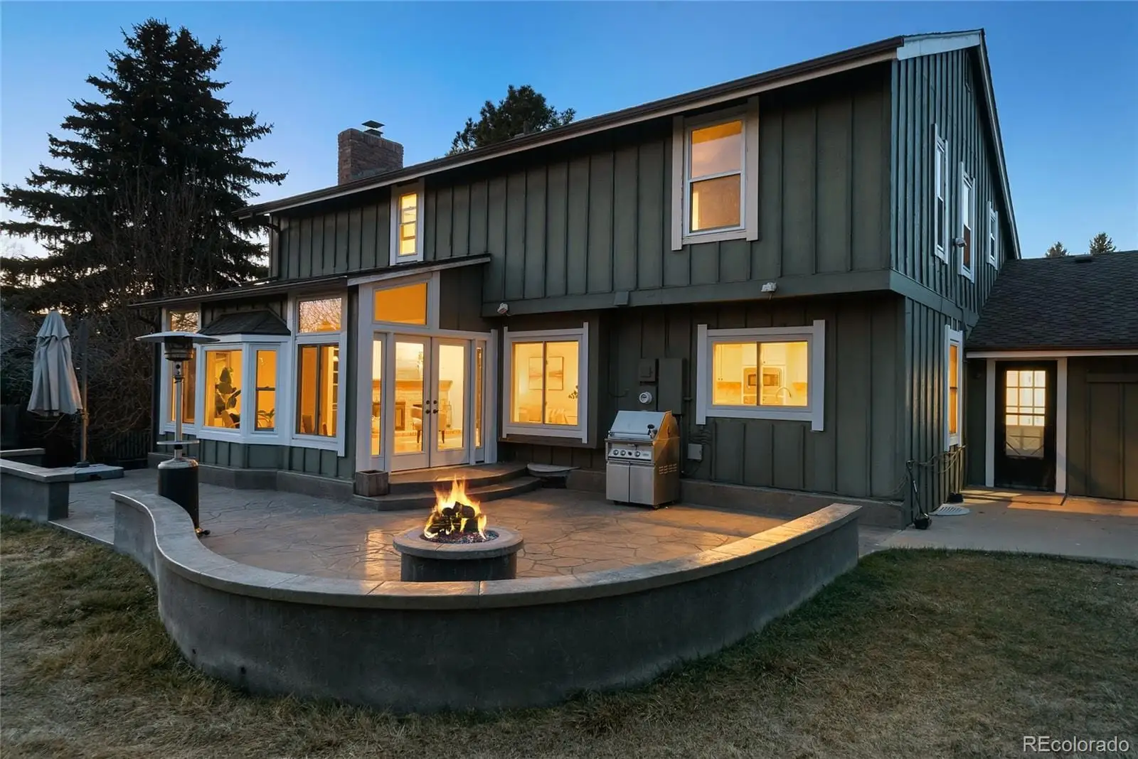 A view of a house with entertaining space at 8876 East Phillips Place