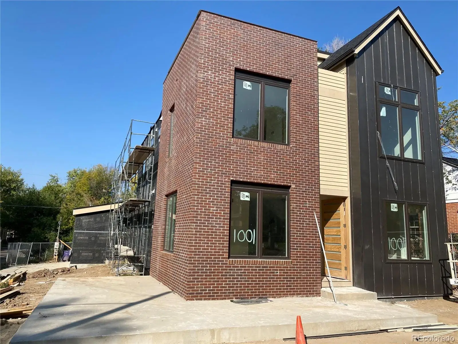A view of a house with a patio at 1001 Newport Street