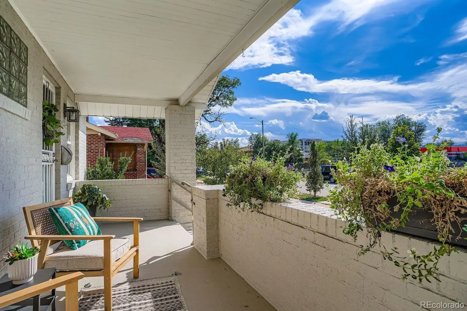 A balcony with table and chairs at 2026 South Lincoln Street