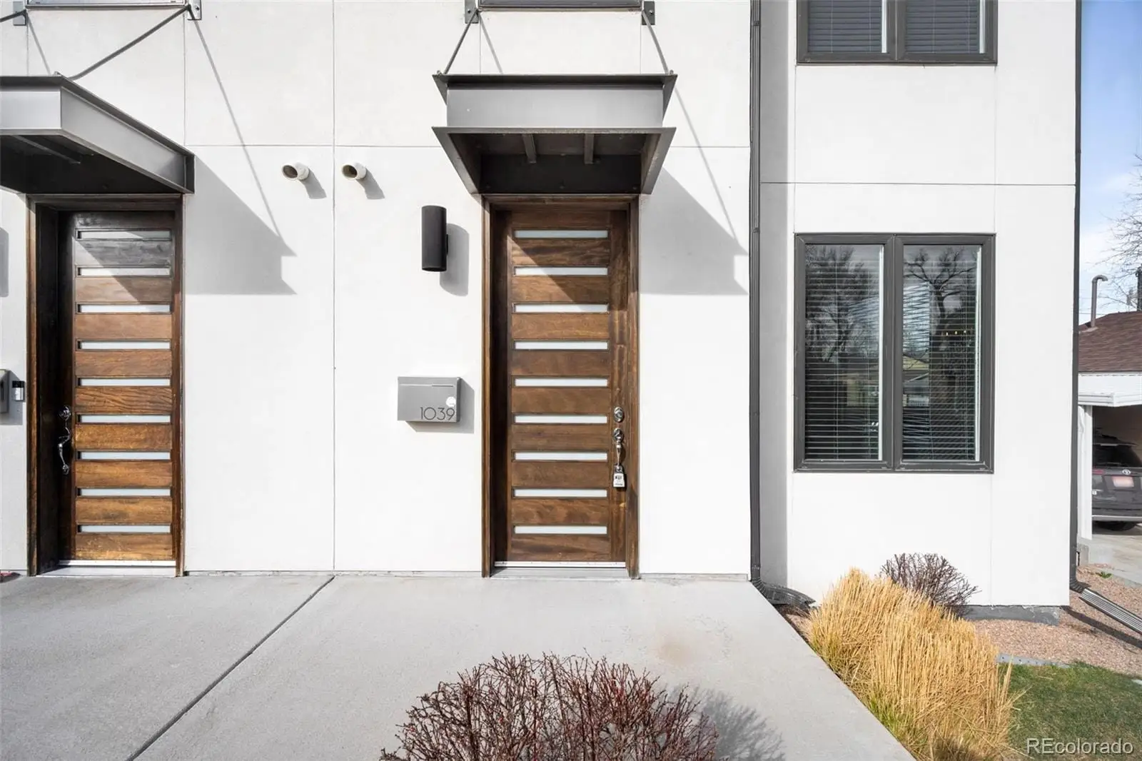 A view of a house with a door and wooden floor at 1039 Julian Street