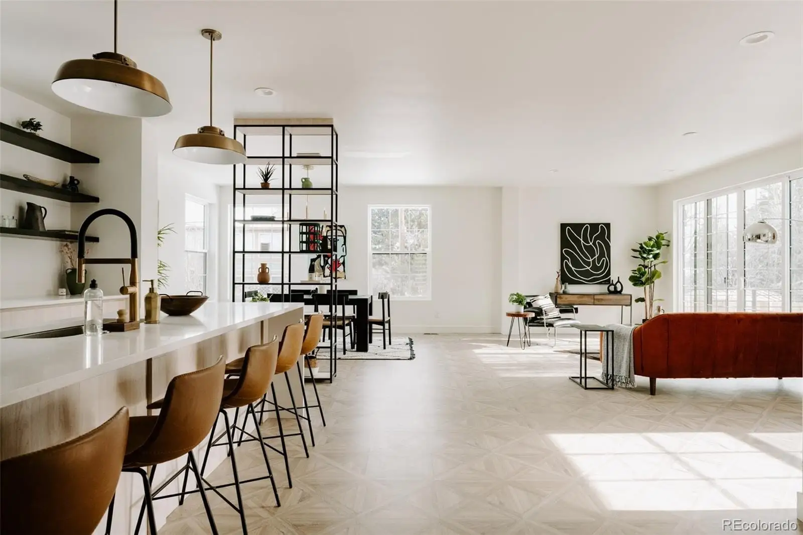 A view of a a dining room with furniture window and wooden floor at 1076 Jasmine Street