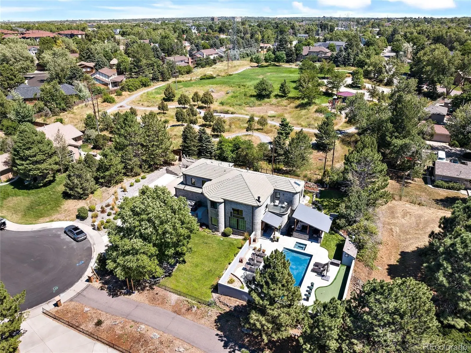 An aerial view of residential houses with outdoor space at 1942 South Xenia Court