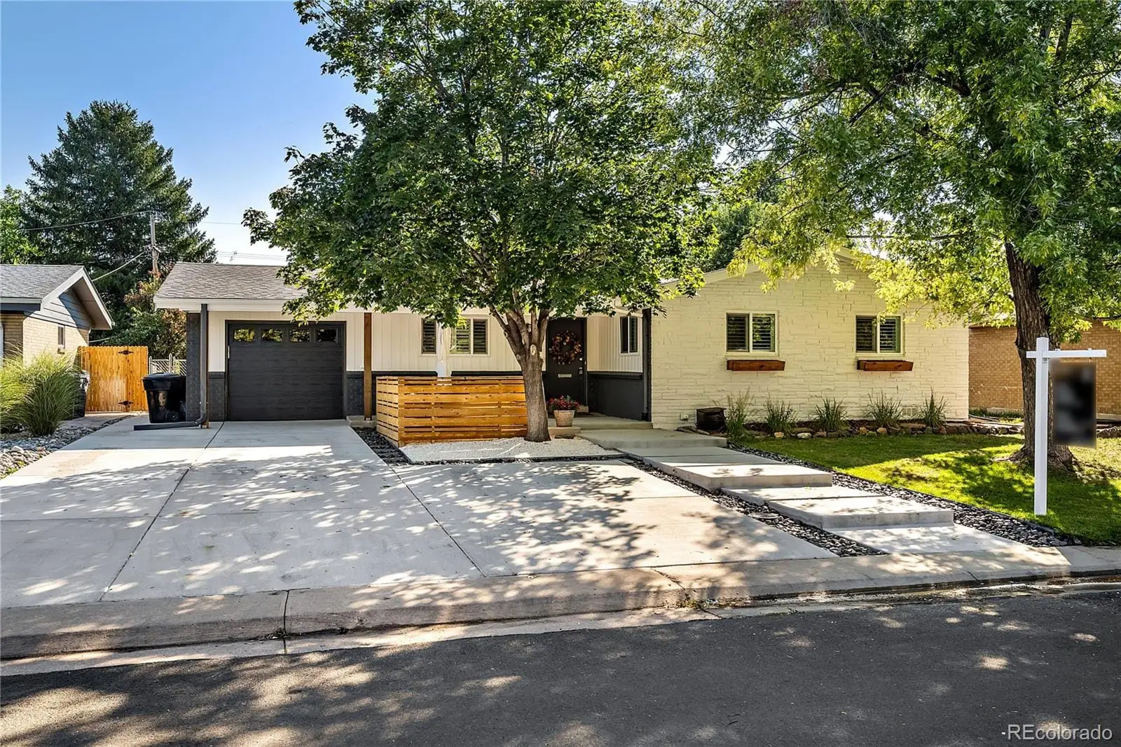 A front view of a house with a yard at 708 South Grape Street