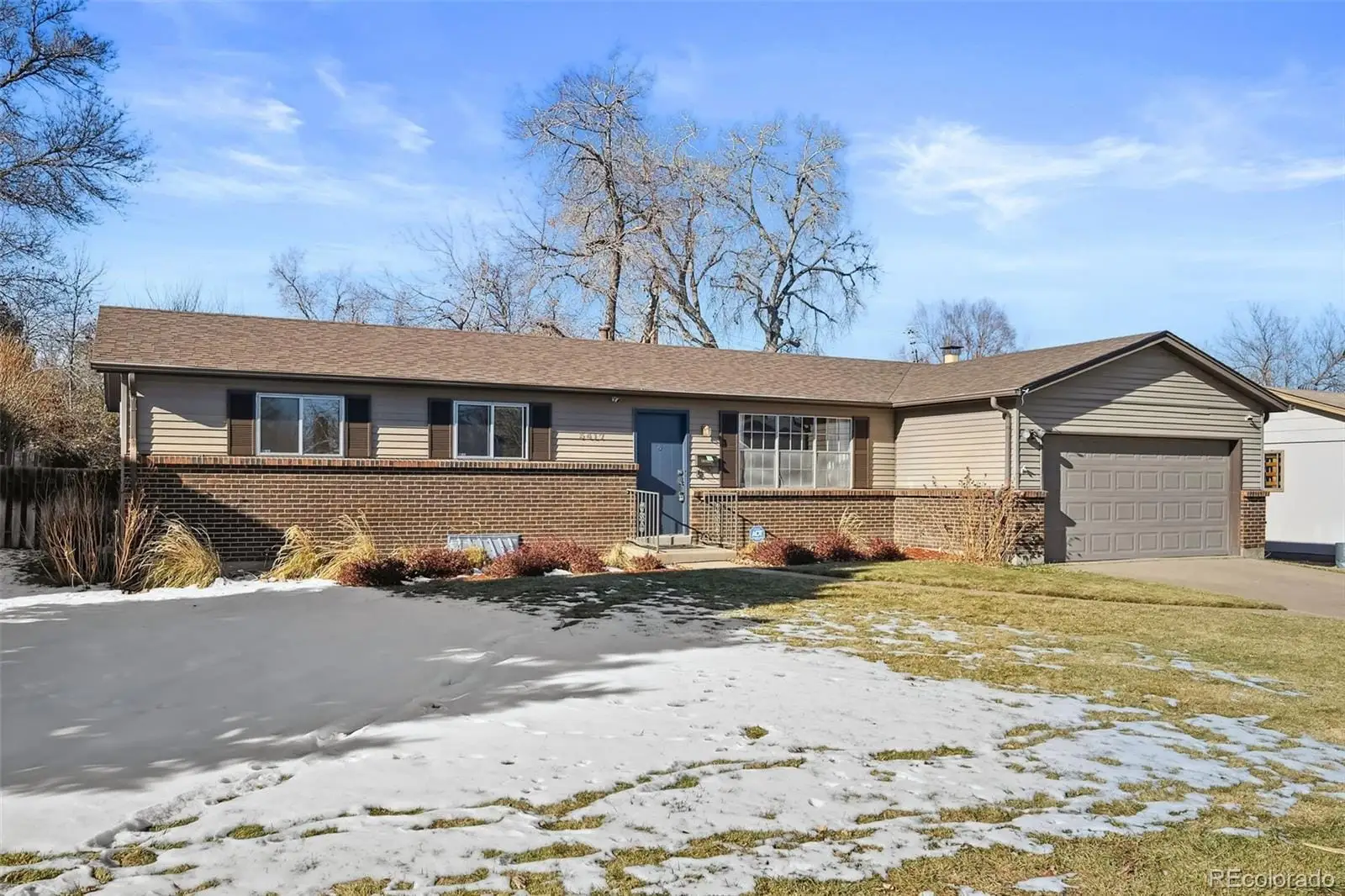A view of a house with a swimming pool at 3417 South Chester Court