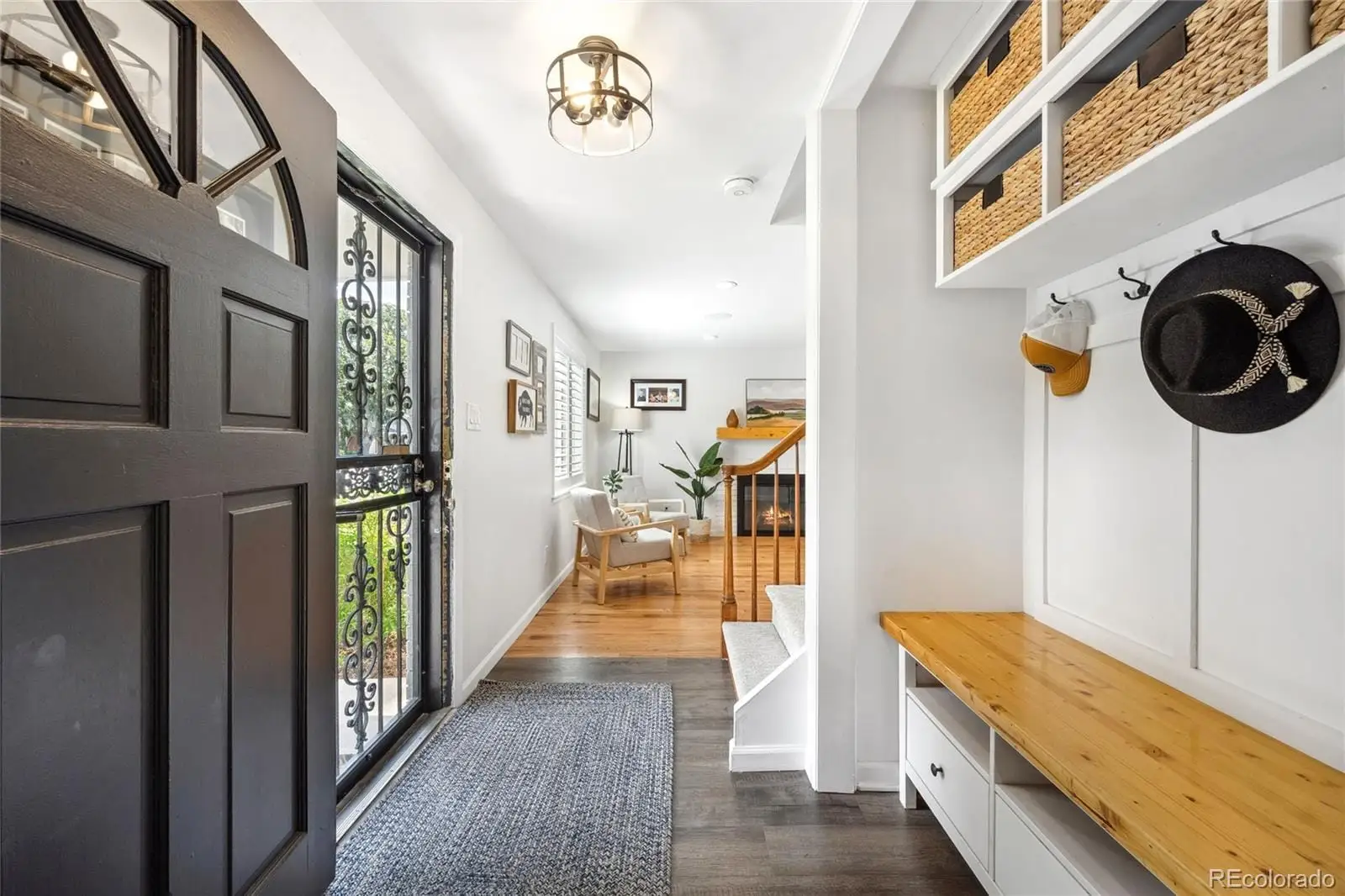 A hallway with a washer and dryer at 1907 South Leyden Street
