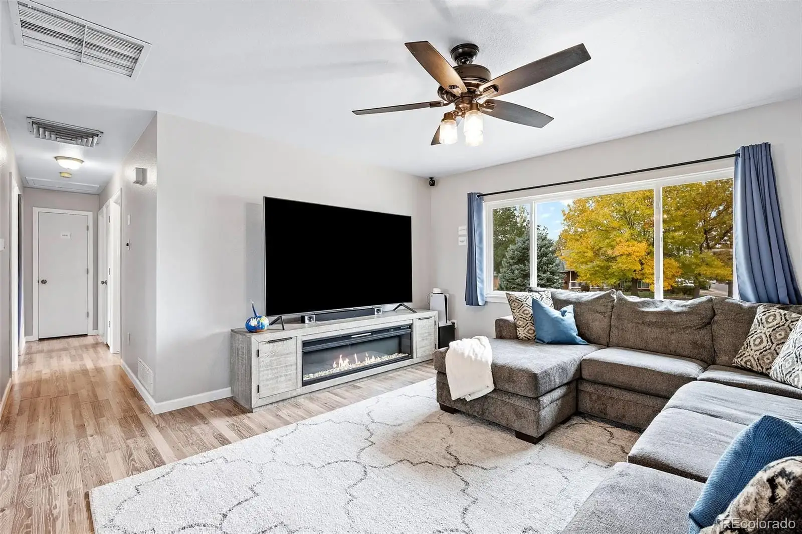 A living room with furniture and a flat screen tv at 300 South 33rd Avenue