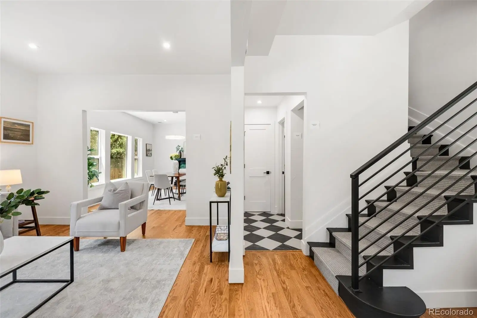A living room with furniture and wooden floor at 2343 Dahlia Street