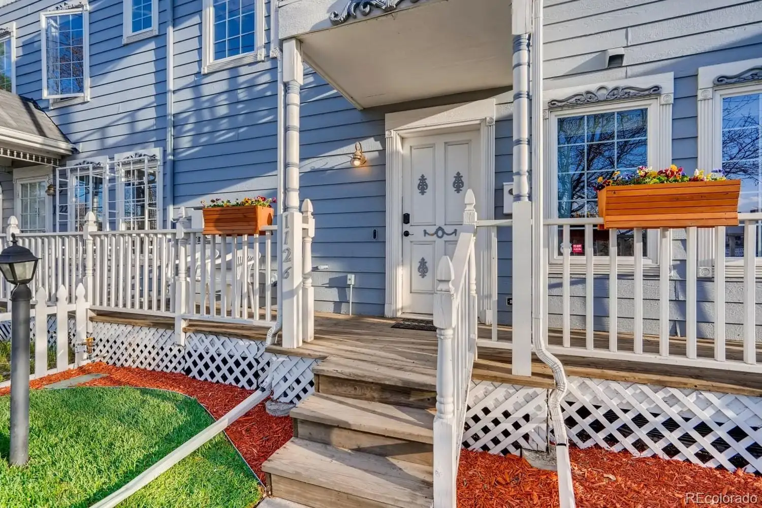 Front view of a house with a yard at 1126 West 10th Avenue