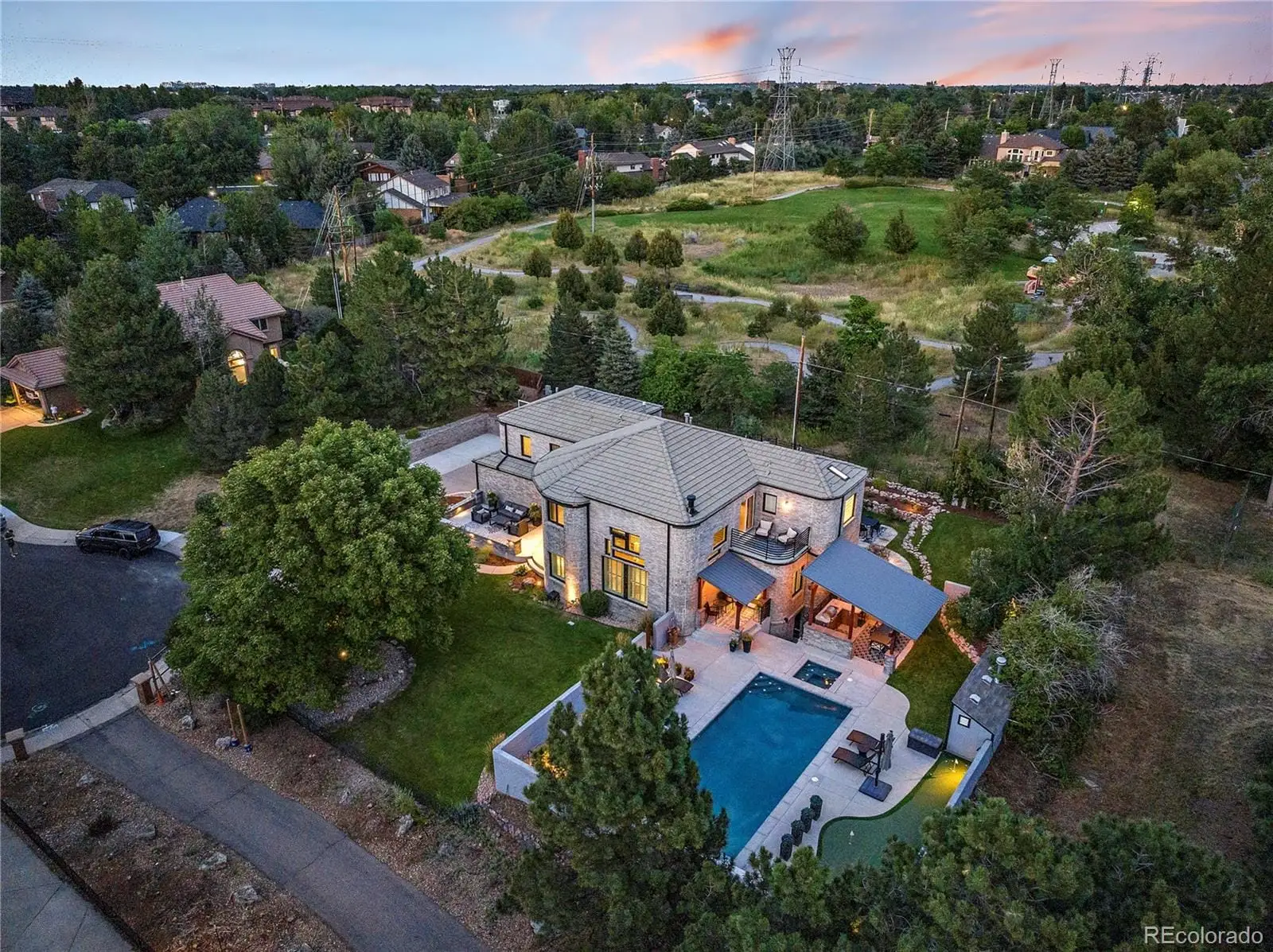 An aerial view of residential house with outdoor space and lake view at 1942 South Xenia Court