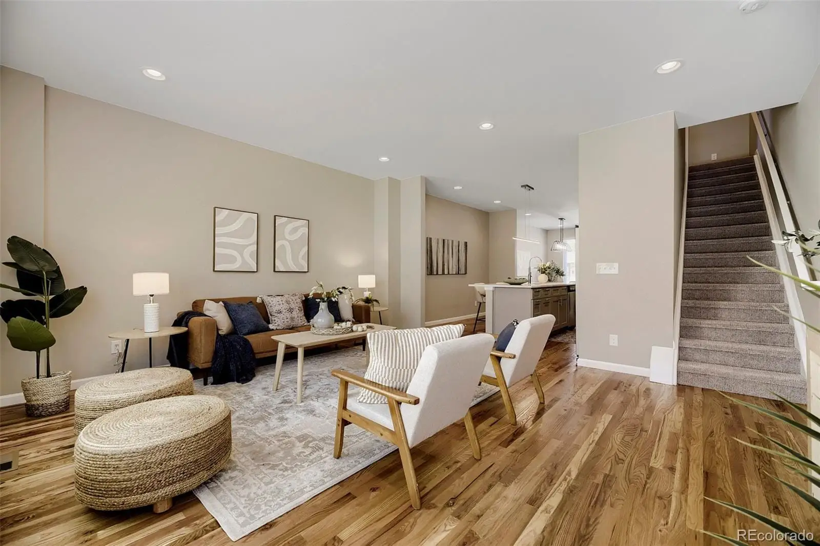 A living room with furniture and wooden floor at 1027 Julian Street