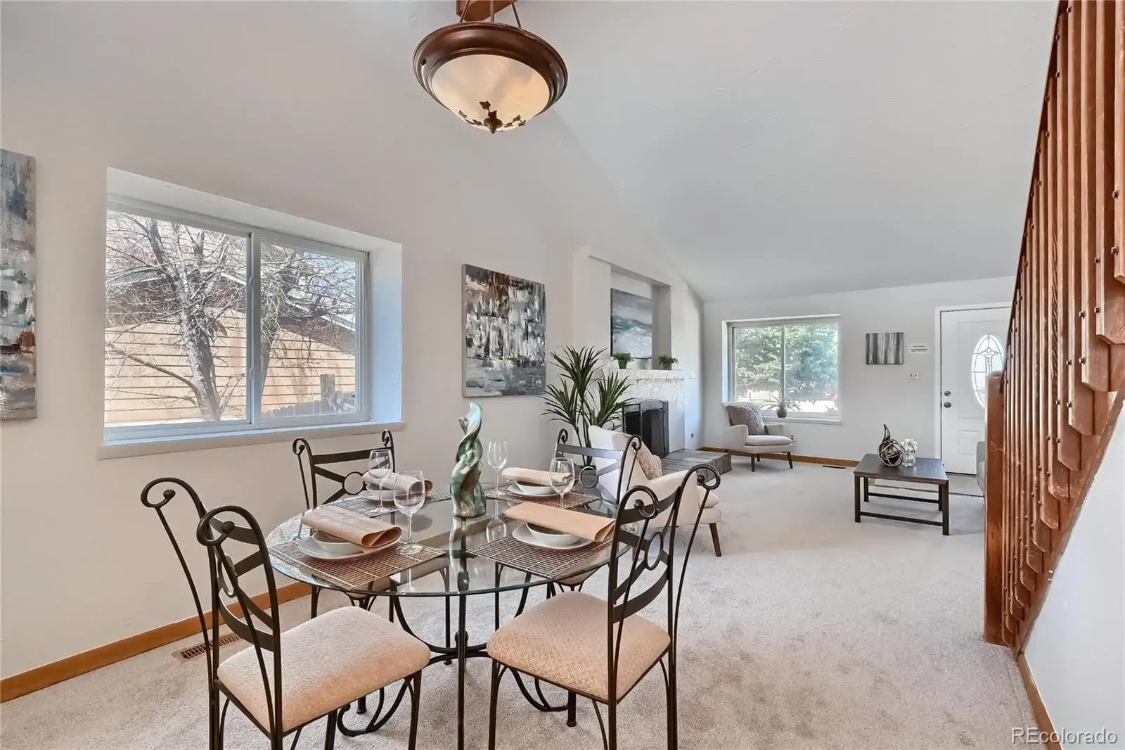 A view of a dining room with furniture window and outside view at 5803 South Miller Street