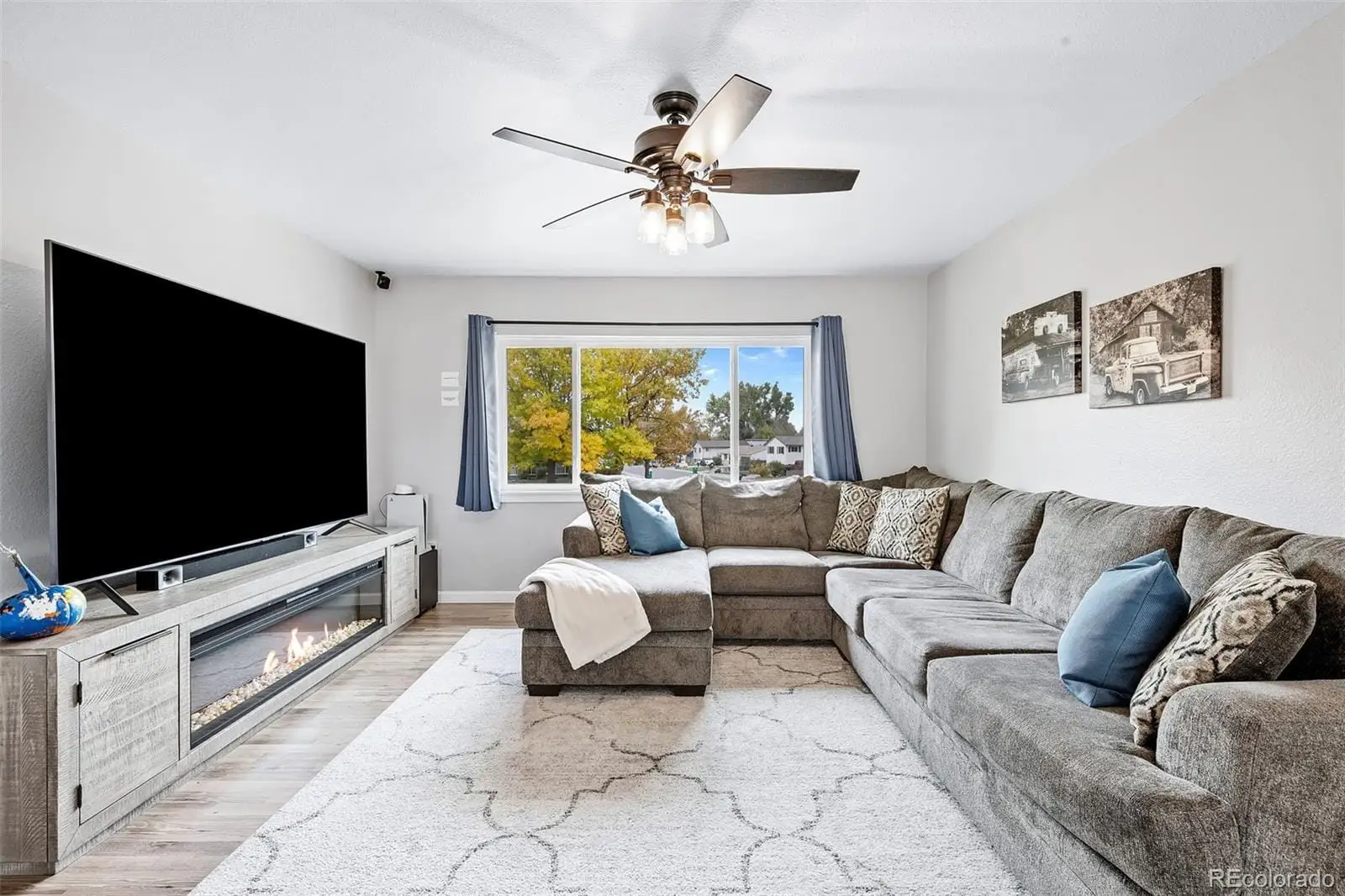 A living room with furniture and a flat screen tv at 300 South 33rd Avenue