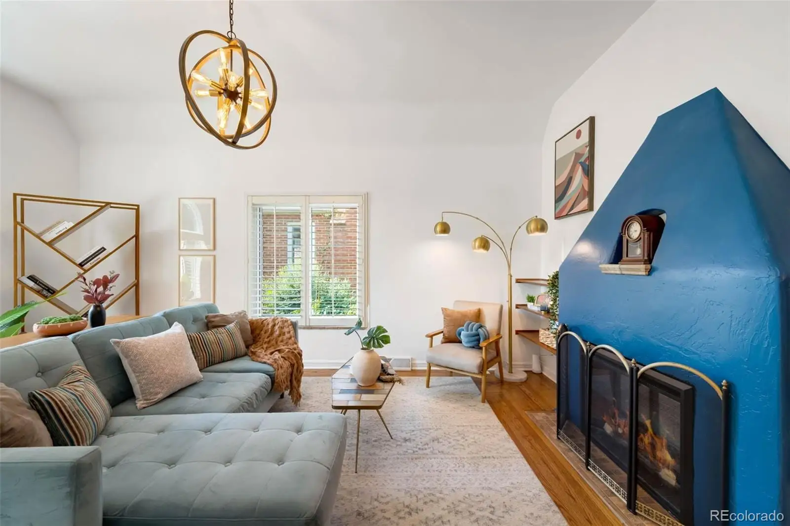 A living room with furniture flowerpot and a window at 3065 Clermont Street