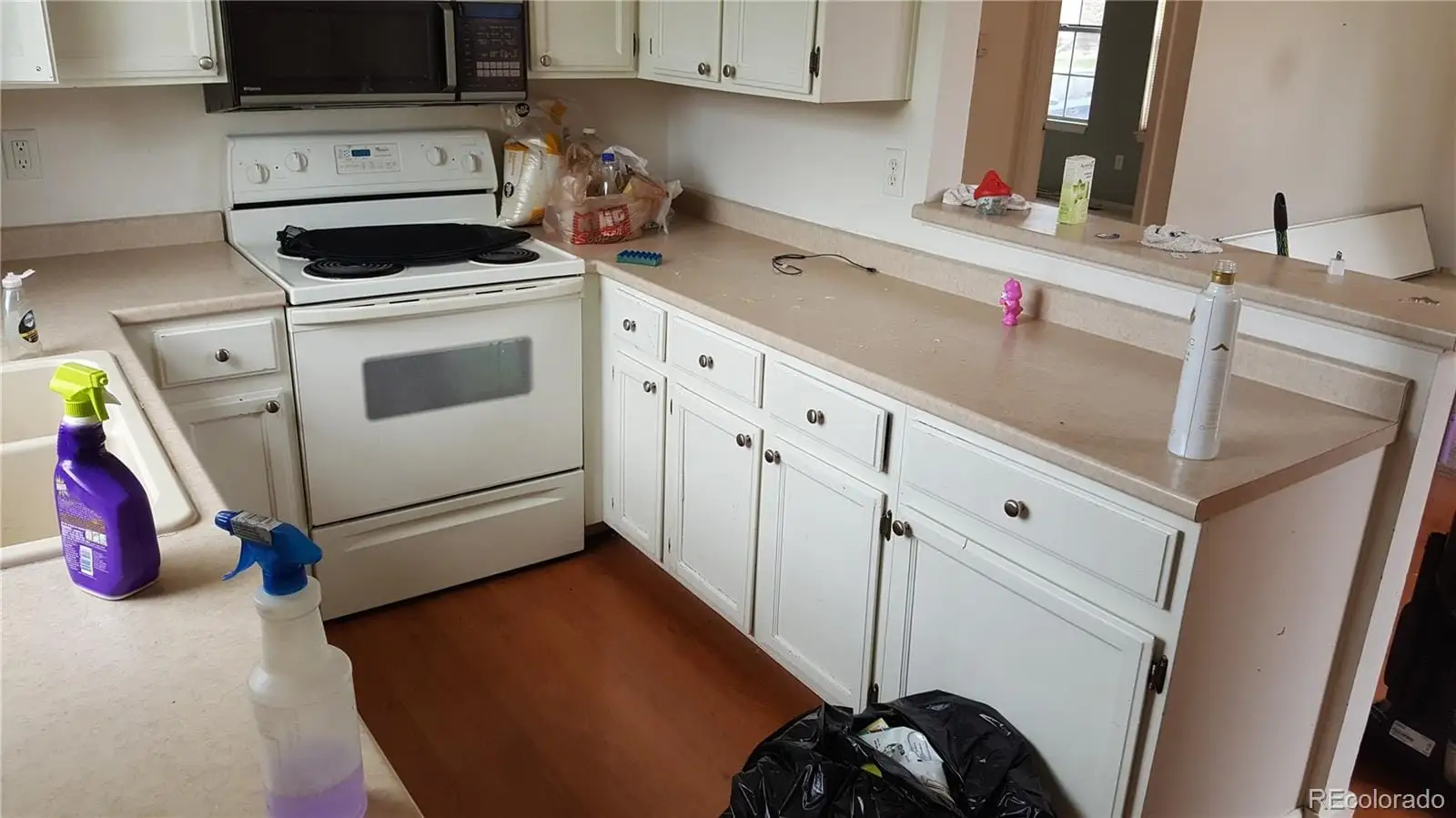 A utility room with dryer and washer at 17155 East Chenango Avenue, Unit A