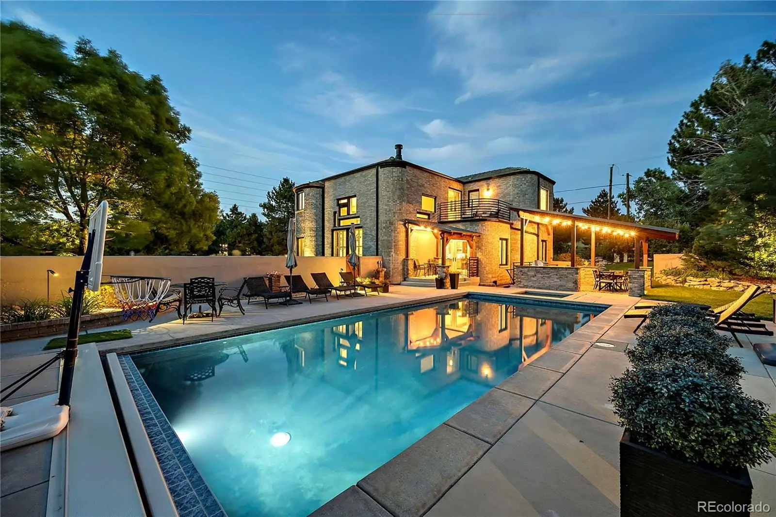 A view of a swimming pool with a patio at 1942 South Xenia Court