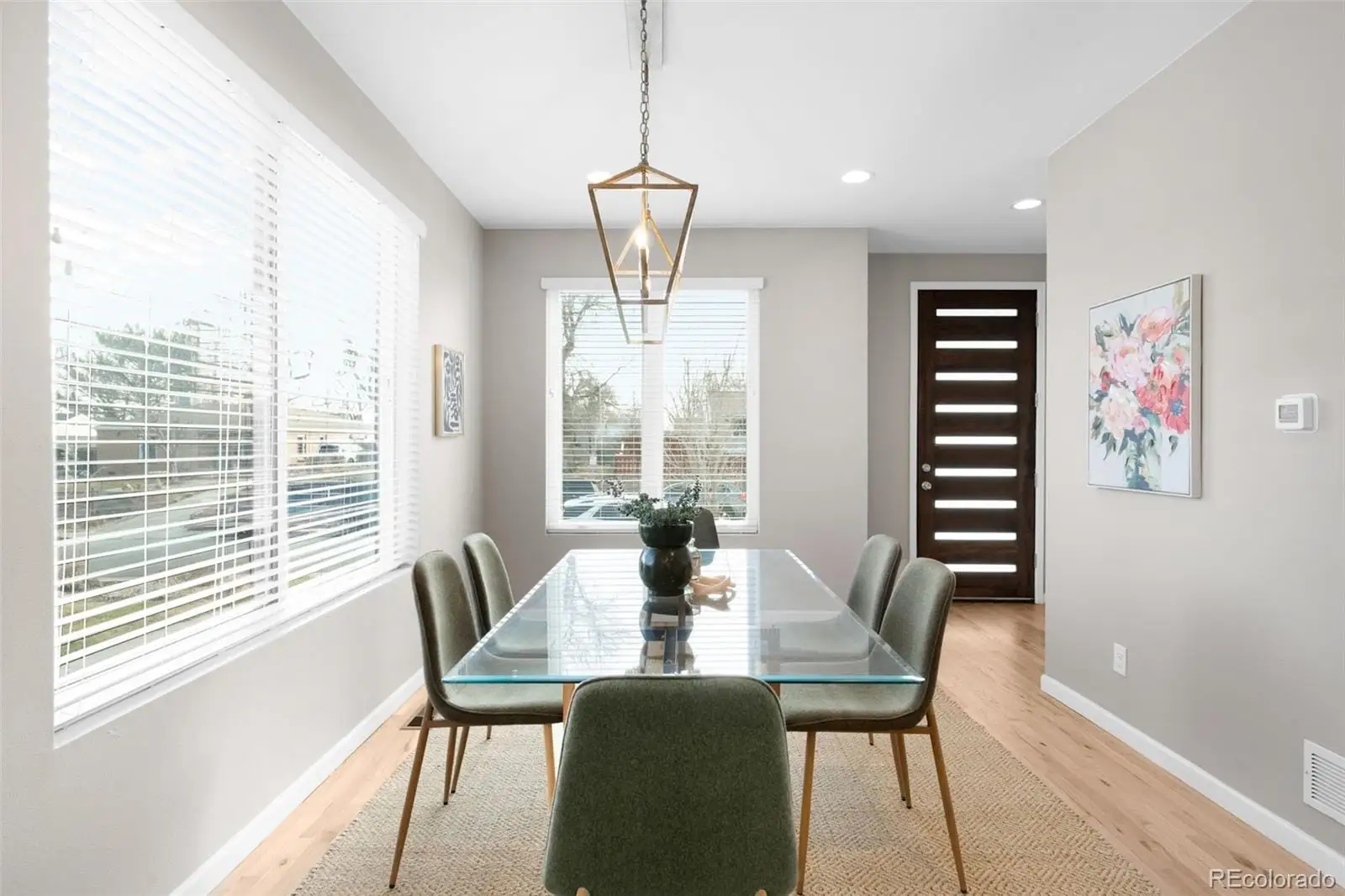 A view of a dining room with furniture window and outside view at 1039 Julian Street