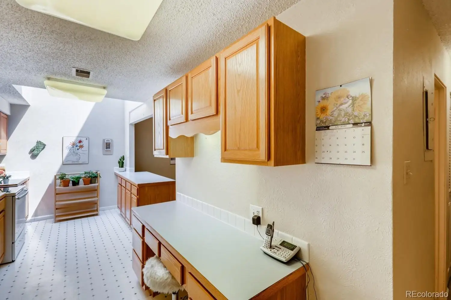 A room with table and chair at 2847 South Locust Street