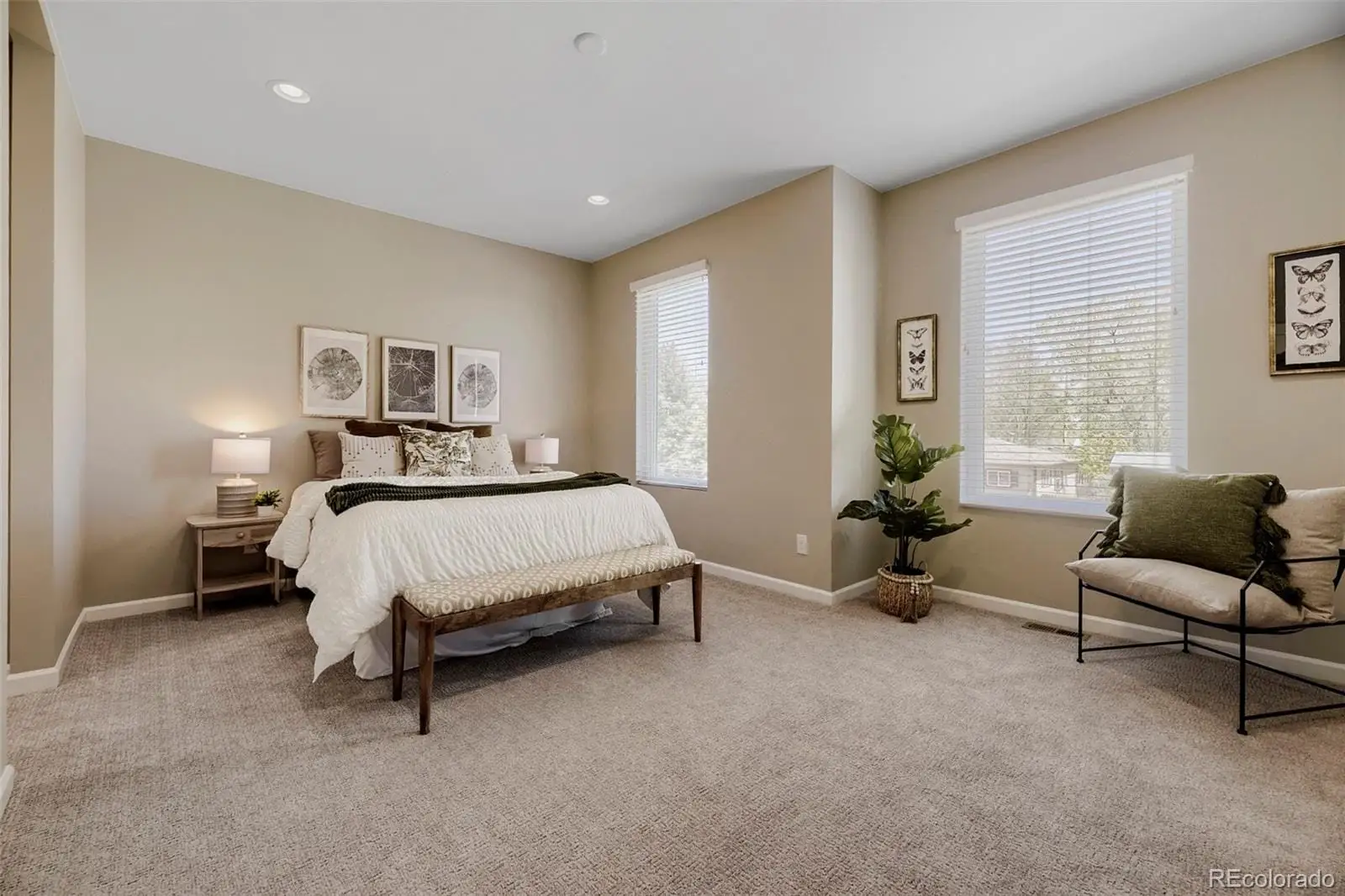 A bed room with a bed and furniture at 1027 Julian Street