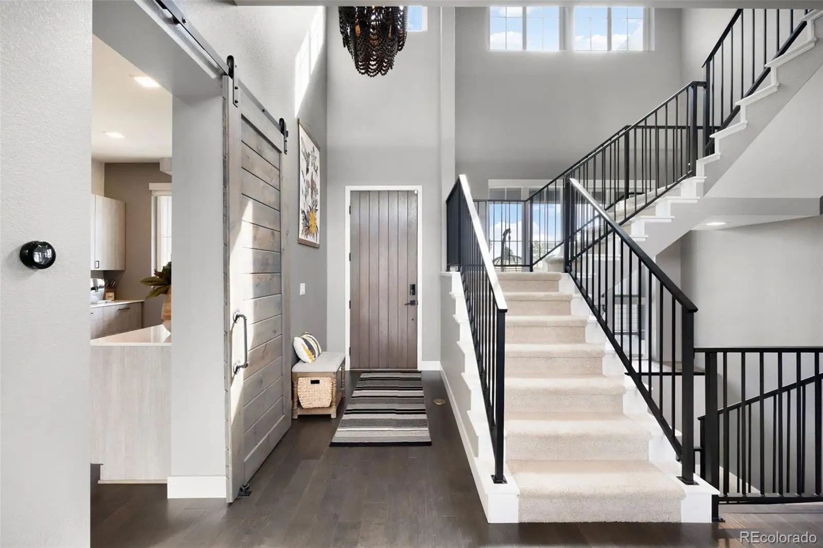 A view of an entryway with staircase at 8203 Merryvale Trail