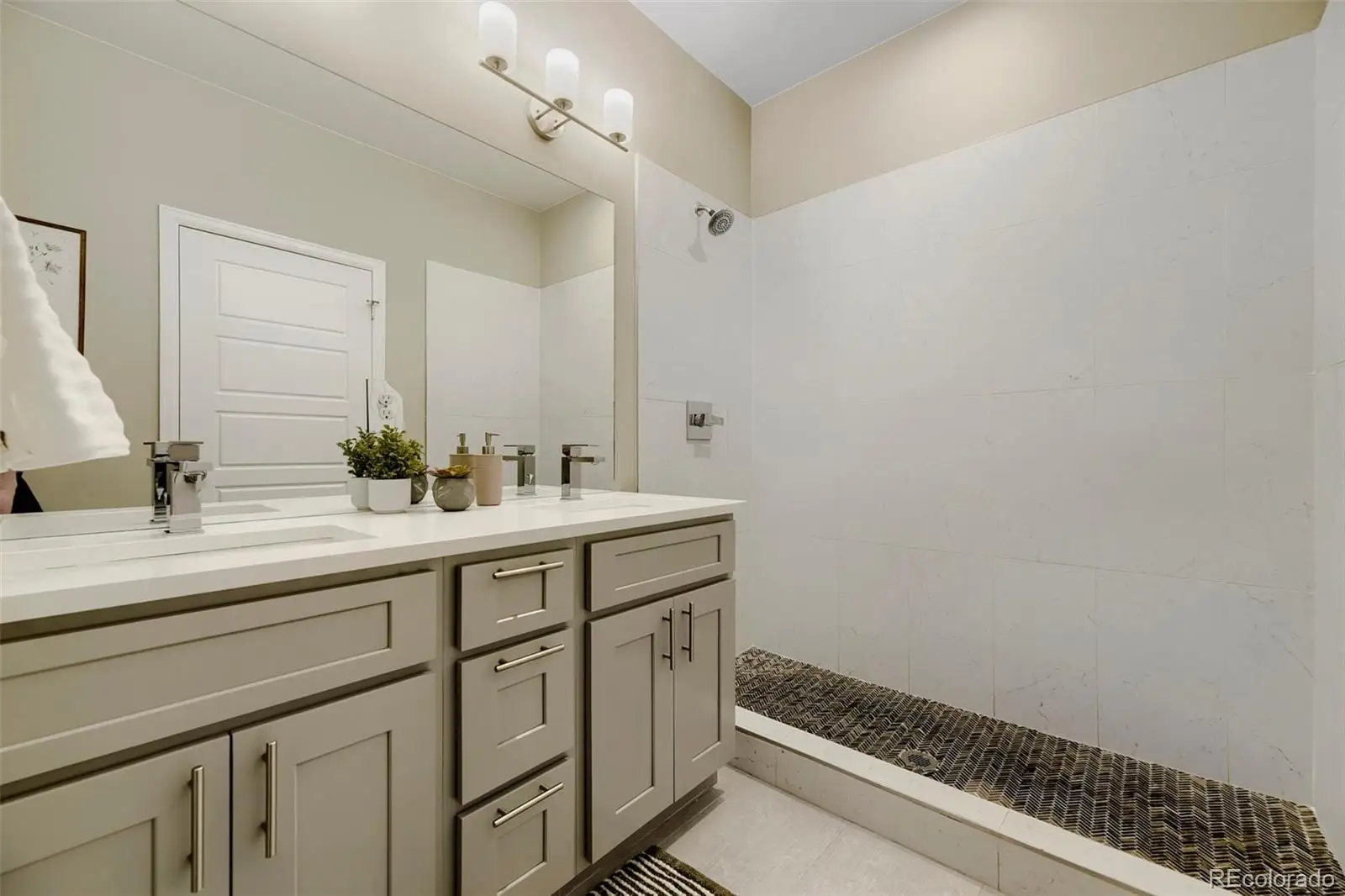 A bathroom with a sink and a mirror at 1027 Julian Street