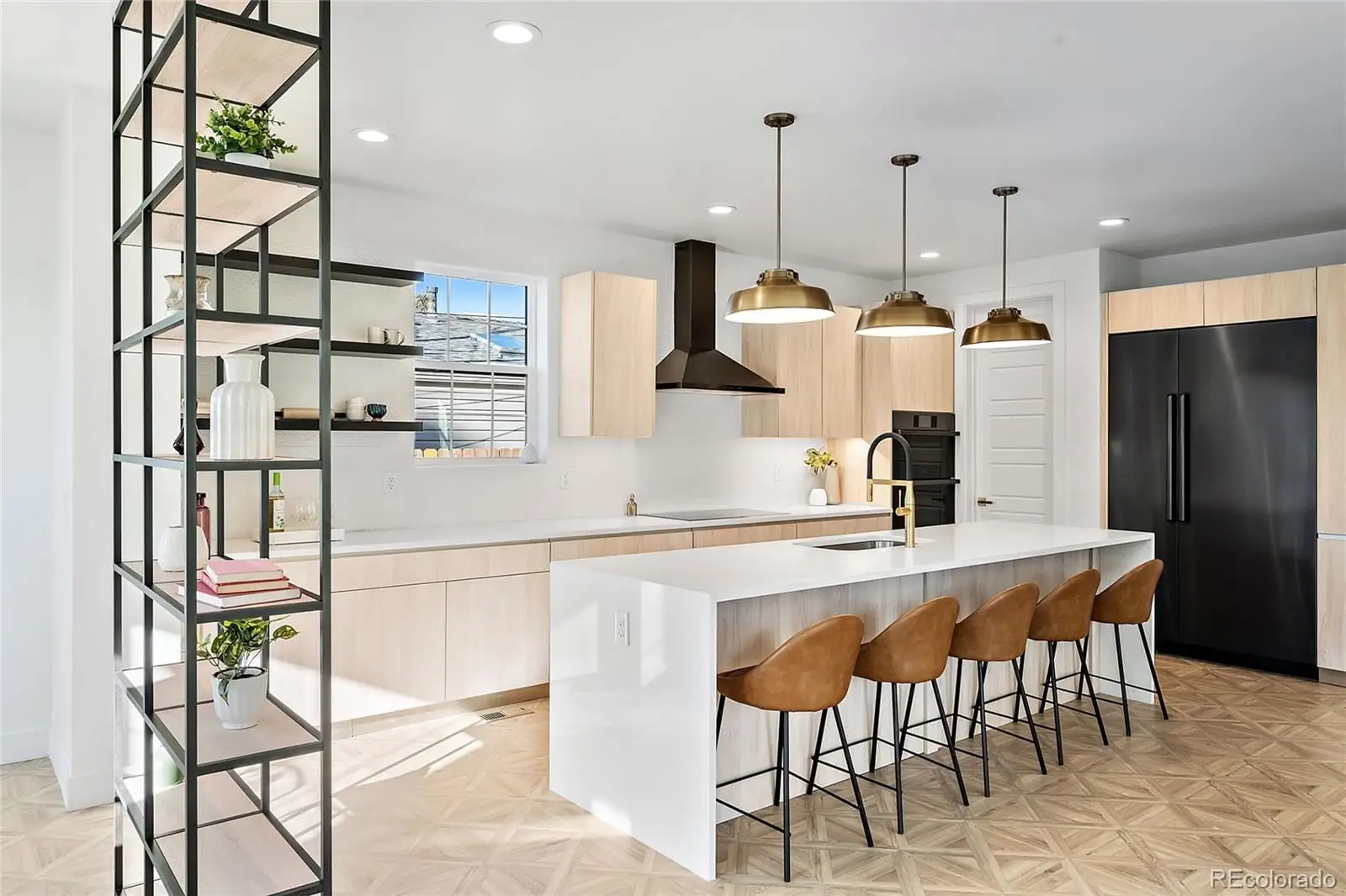 A large kitchen with a table and chairs at 3217 South Elm Street