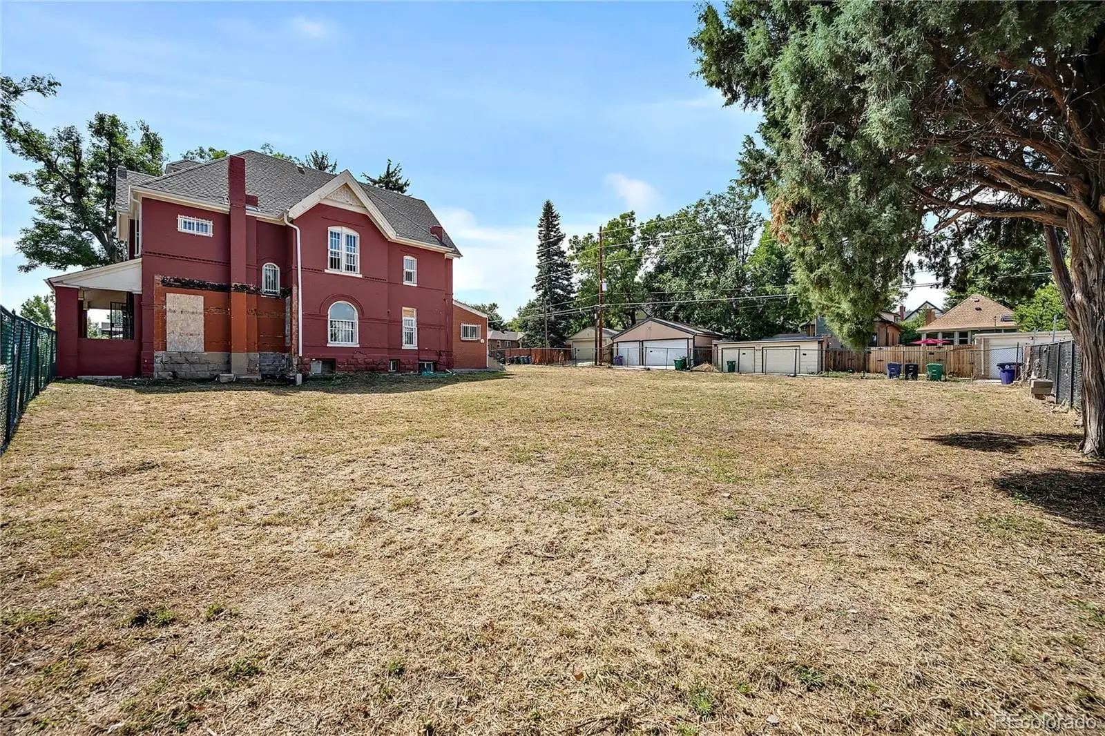 A view of a house with a yard at 2515 North Gaylord Street