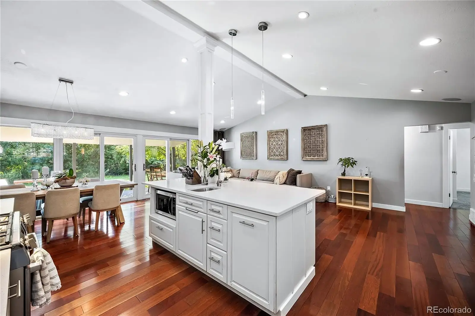 A kitchen with lots of counter top space wooden floor and appliances at 708 South Grape Street