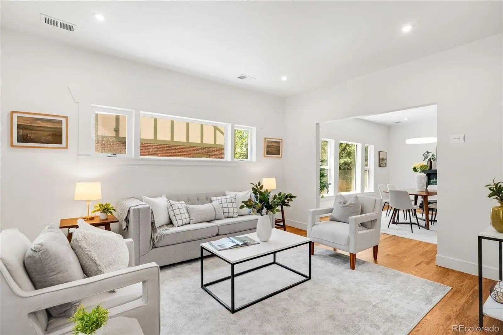 A living room with furniture and a rug at 2343 Dahlia Street