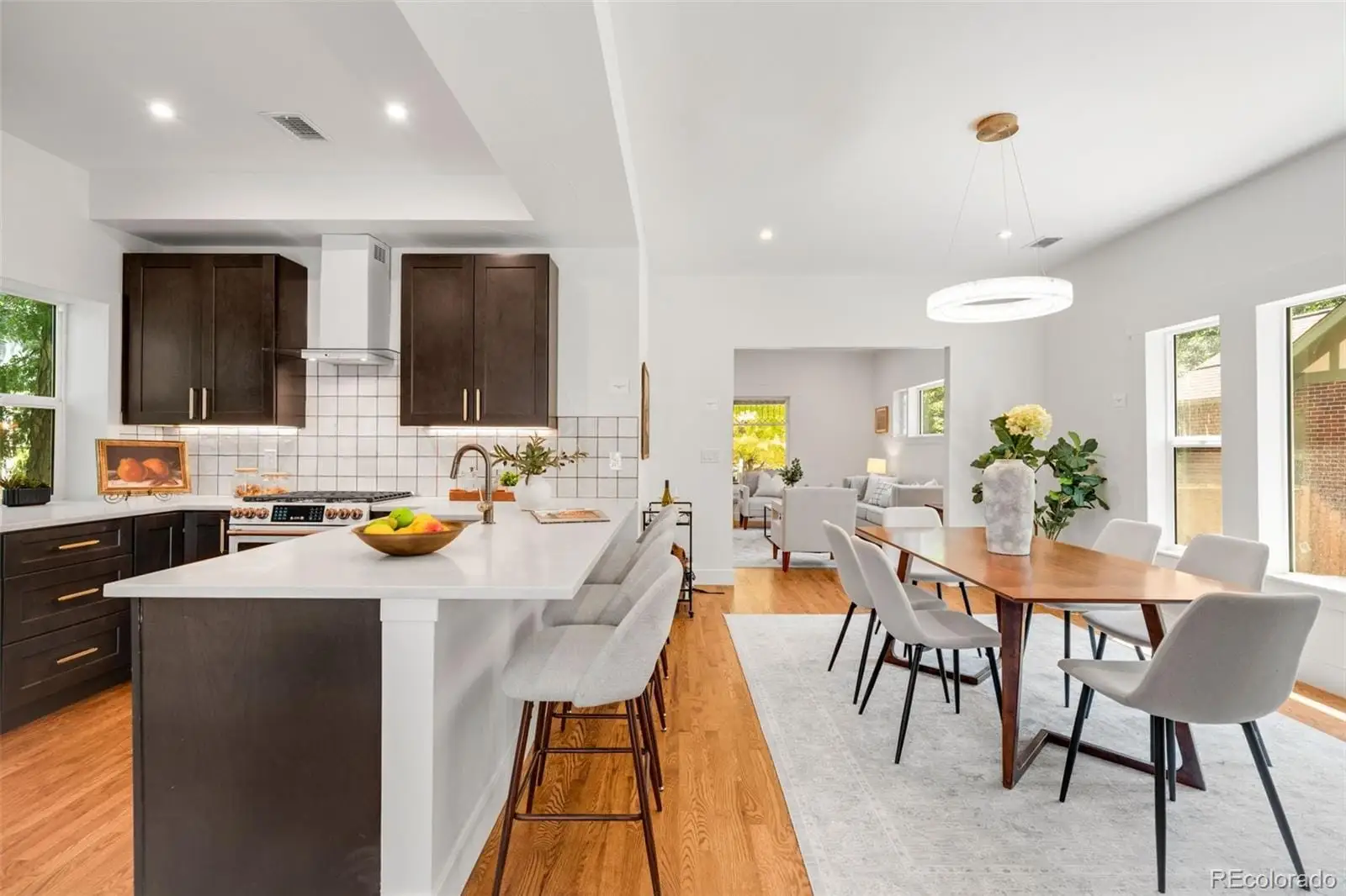 A view of a dining room with furniture and window at 2343 Dahlia Street